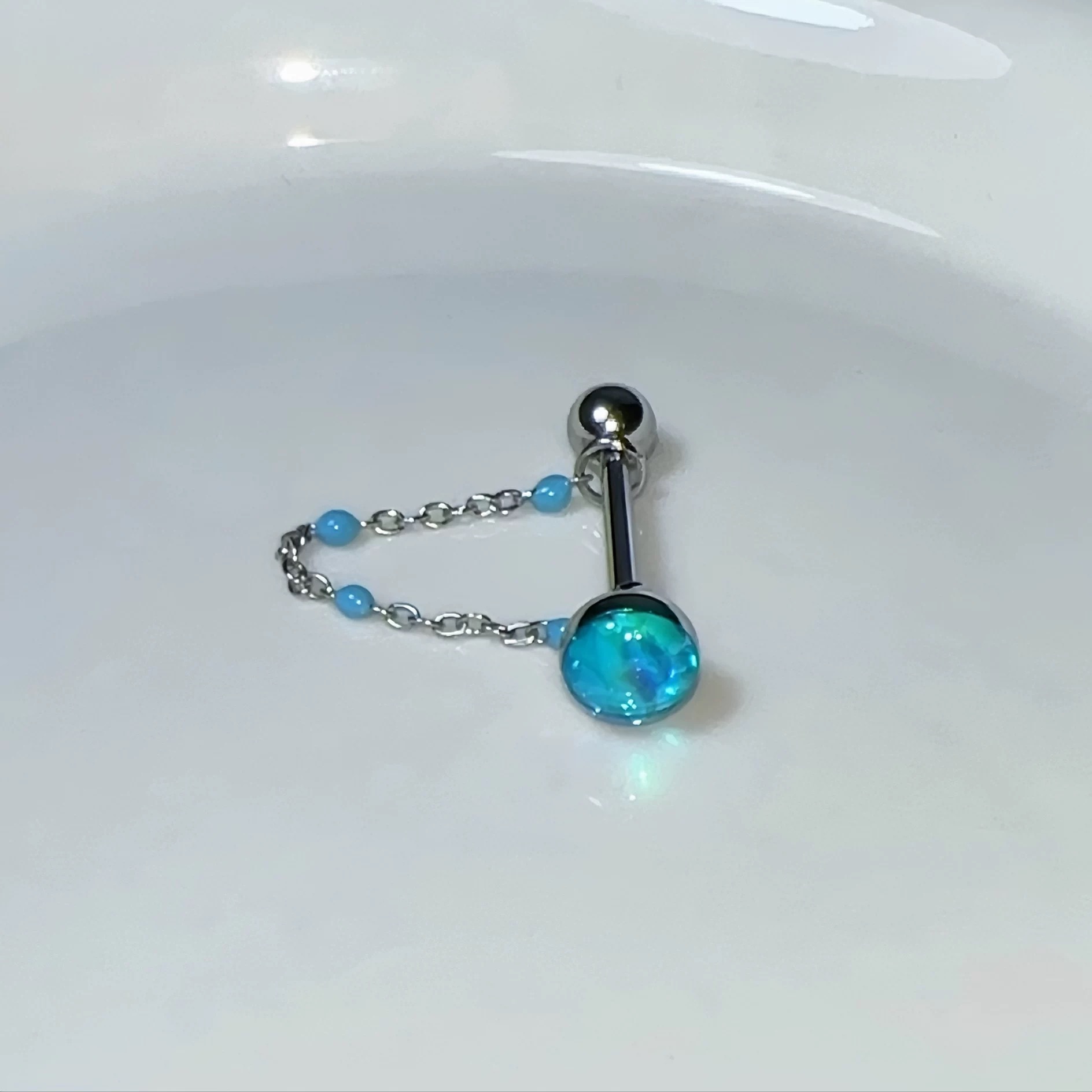 จิวเจาะลิ้นไทเทเนียมสตีลพร้อมโ - Body Jewelry Titanium บทวิจารณ์และราคา
